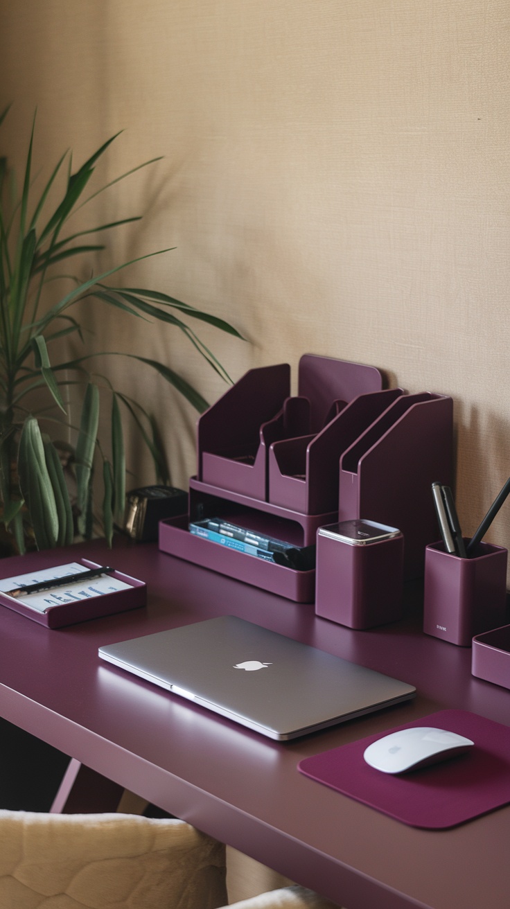 Deep plum desk accessories including organizers and a mouse pad on a home office desk